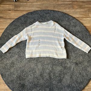 Distressed sweater